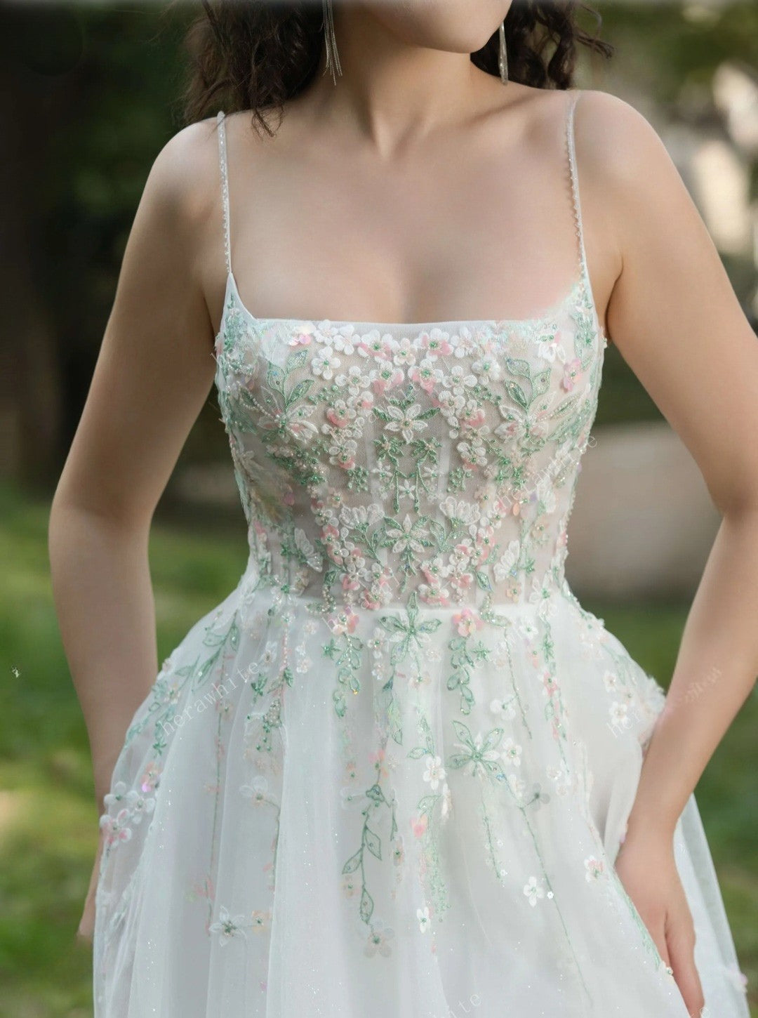 Woman wearing a floral dress with a blurred background
