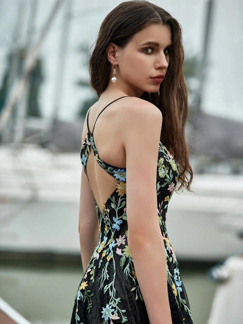 Woman wearing a floral dress with a blurred background